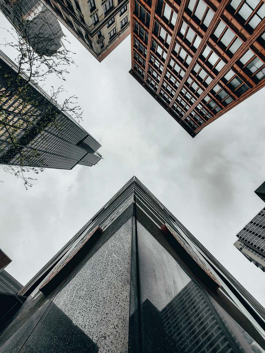 office building worm's eye view photo of buildings urban